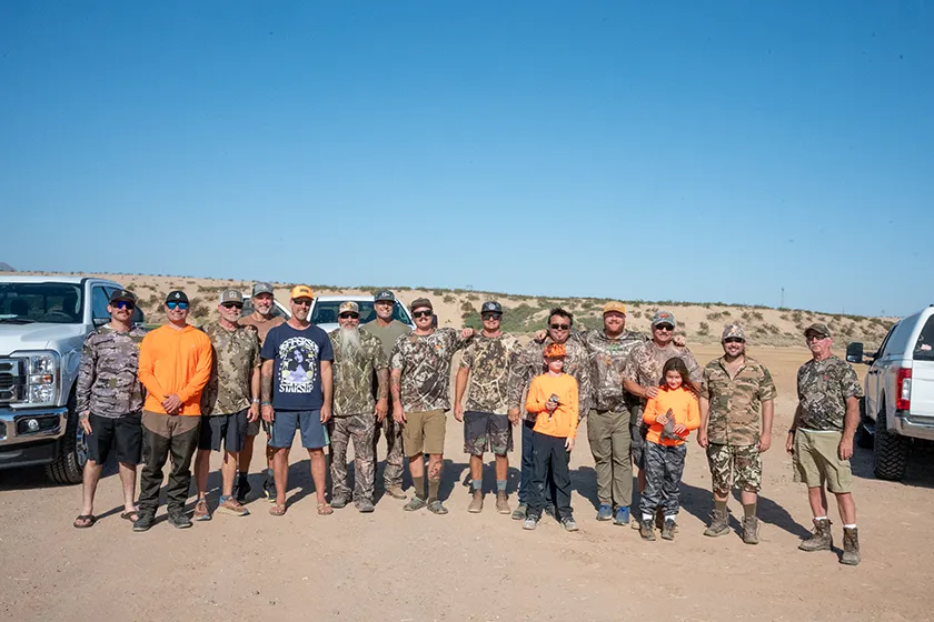 a group of people hunting doves