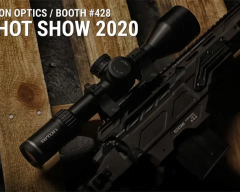 Riton Shot Show 2020 booth announcement photo with a gun on a pallet