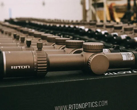 x3 Tactix 1-8x24 FDE lined up on boxes