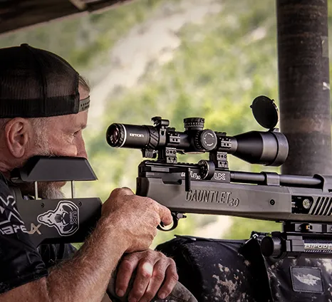 Air rifle with Riton Conquer scope mounted